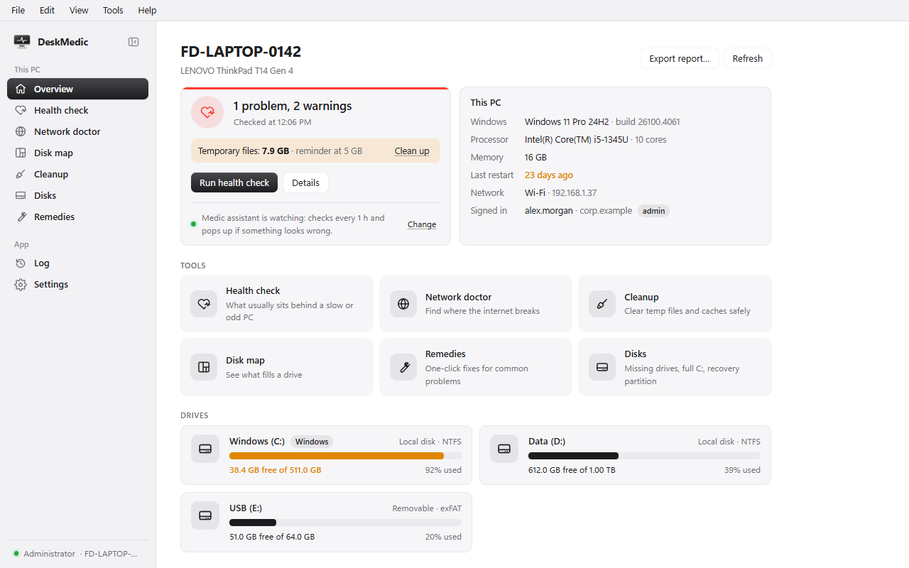 DeskMedic's overview of a laptop: 1 problem and 2 warnings, 7.9 GB of temporary files, PC details, tool tiles and three drives.